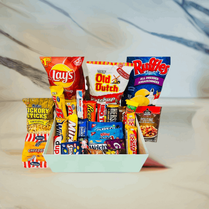 Best Canadian Snack Box consists of lays ketchup, all dressed ruffles, old dutch ketchup, cadbury chocolates. Christmas Gift Box